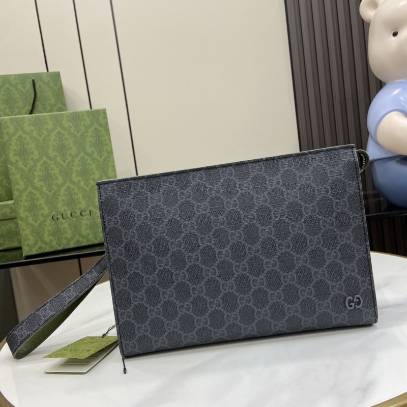 G*u*i clutch bags